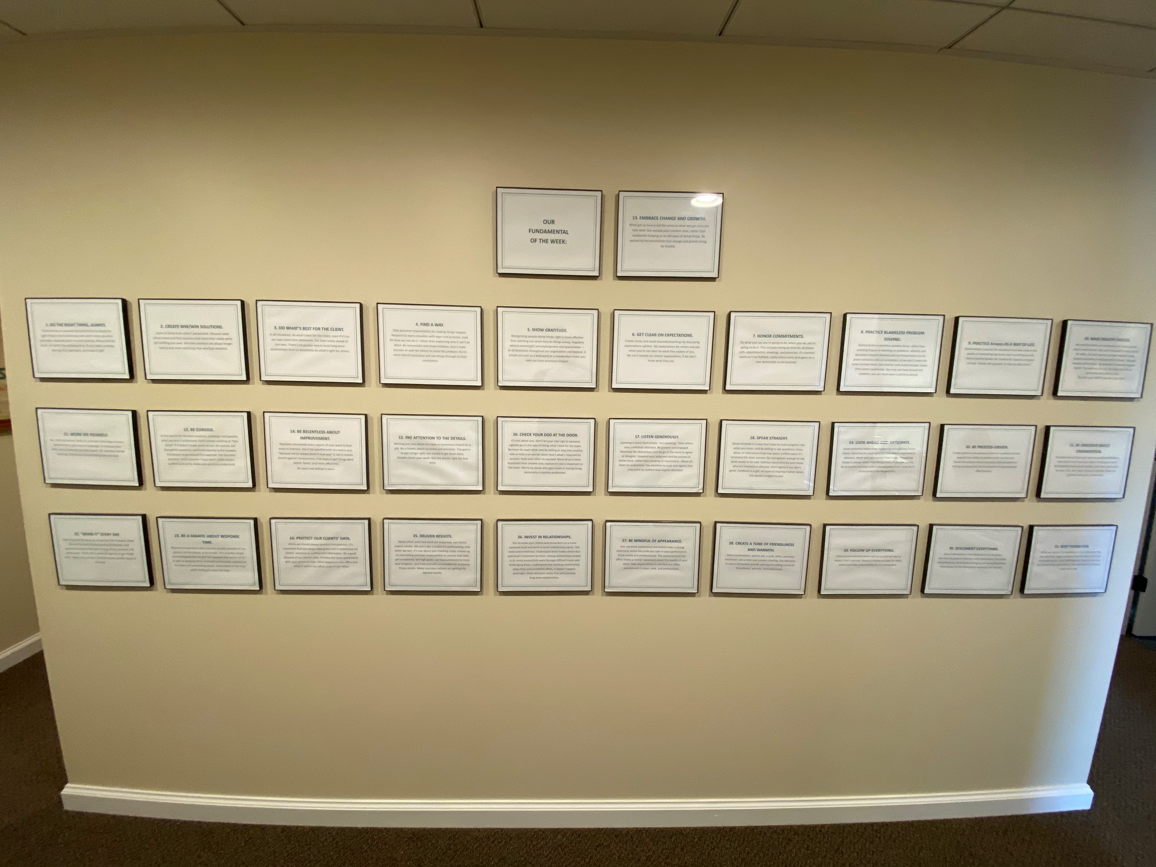 31 Fundamentals framed and hanging on wall.