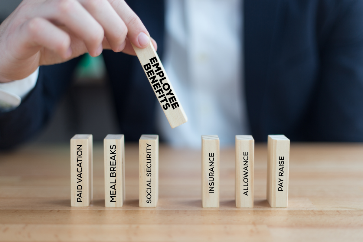 Hand selecting a domino labeled 